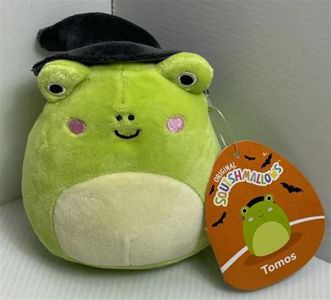 Squishmallow frog with a pointy witch hat